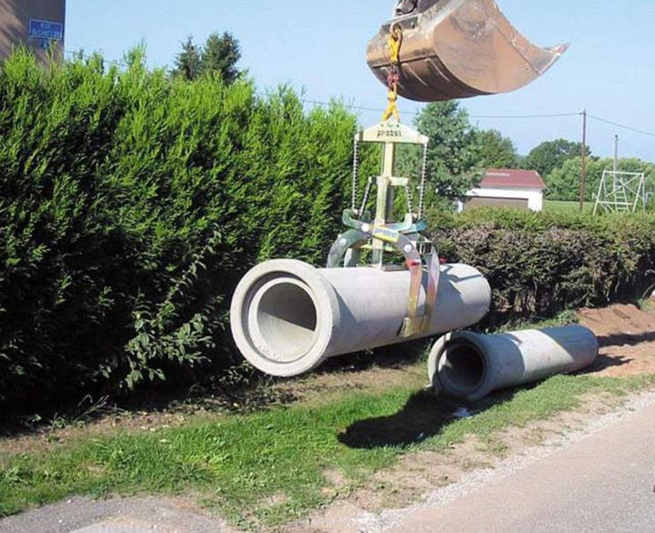 Probst Manhole and Pipe Laying - Handling & Laying